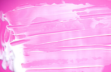 Cosmetic sample of white lotion on colored background. Calm, tactile, and visually striking