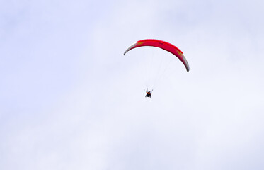 Paragliders high in the sky. Recreational air sports.
