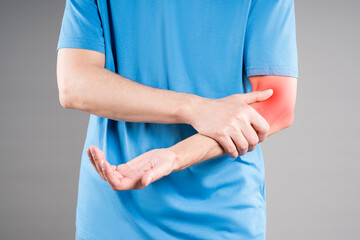 Diseases of the elbow joint, bone fracture and inflammation, man suffering from pain in cubit