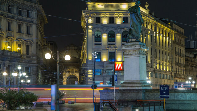 Cordusio Square and Dante street with surrounding palaces, houses and buildings day to night timelapse