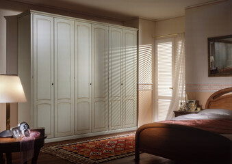 Single shot photo of a room with a wardrobe