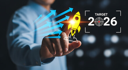 A person's hand interacting with a digital rocket and target, representing future goals.