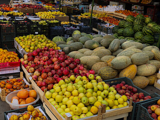 Fruit stand with assorted fresh produce at local market