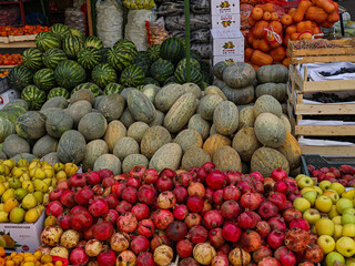 Fruit stand with assorted fresh produce at local market
