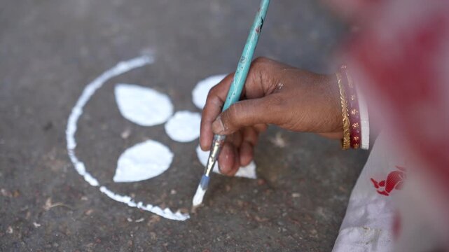 bengali alpona drawing on floor by human \bengali culture 