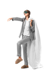 Female sleepwalker in pajamas with blanket on white background