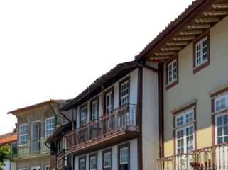 Old European building with colorful facades and stone walls, showcasing traditional architecture and