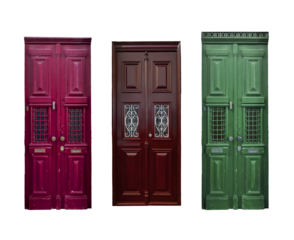 Old wooden door set, vintage architectural entrance with ornate carvings and weathered texture.