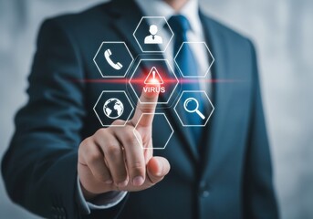 Businessman pointing at a digital screen displaying a virus warning symbol, representing cybersecurity and data protection