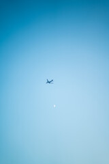 a plane flying high in the sky