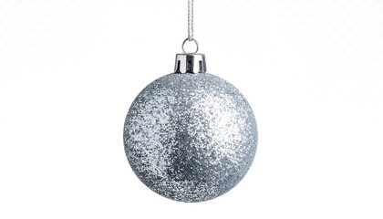 Close-up of a glittering silver holiday ornament against white