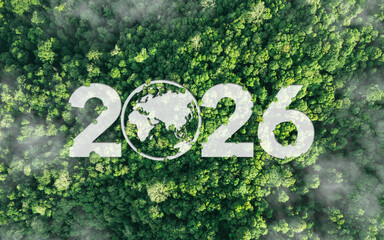 Fototapeta premium Aerial view of green forest with 2026 and Earth icon for environmental awareness, sustainability goals, and climate change action, happy new year and environment day, carbon reduction to net zero.