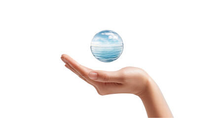 Woman's Hand Holding a Sphere Reflecting the Ocean and Sky