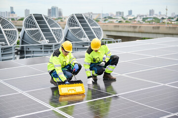 Technicians working on solar panels, showcasing renewable energy and sustainable technology