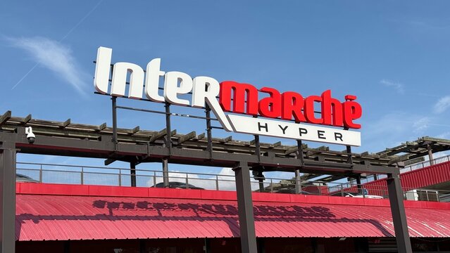 Cagnes-sur-Mer, France - 10 18 2025: Intermarch&eacute; logo on the roof of a supermarket building in France.