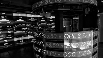 Scenic view of stock exchange LED screen presenting market trends and currency sale charts