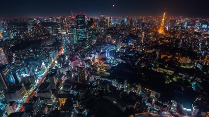 City skyline illuminated at night with glowing and vibrant urban lights showcasing modern architecture and nightlife energy