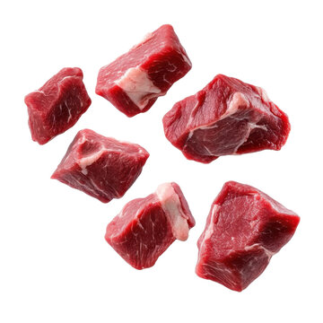 Pieces of raw beef meat flying in air isolated on transparent background.