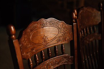 Wooden lacquered chair with carvings