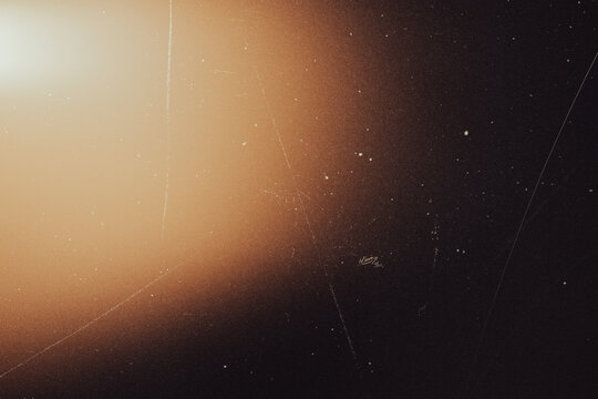 light leak overlay effect with scratch dust and blur light leaks,retro grain noisy film distressed texture light leak flare on black background,grunge background with rays of light - Powered by Adobe