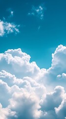 Vast expanse of fluffy white cumulus clouds against a bright blue sky