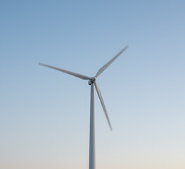 Wind Turbine Generating Power Against a Clear Sky
