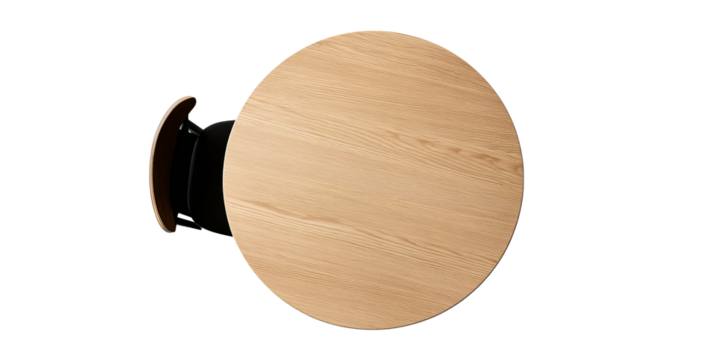 overhead view of a black circular table with dark green plants in the center, surrounded by  chairs arranged around it, set against an isolated white background. the scene is captured from ab