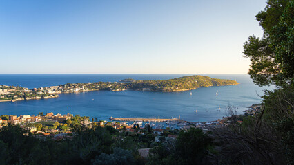 panaromic view of villefranche sur mer with sea at sunset