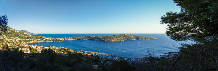 panaromic view of villefranche sur mer with sea at sunset