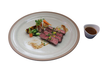 A Delicious Plate of Sliced Steak Served with Vegetables