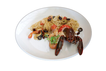 A delicious pasta dish featuring shrimp, olives and tomatoes