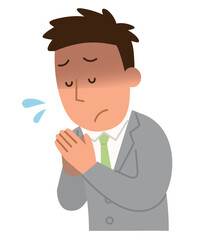手を合わせて謝る会社員男性1