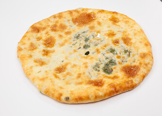 Georgian Khachapuri Pkhlovana With Herbs and Melted Cheese On White Surface