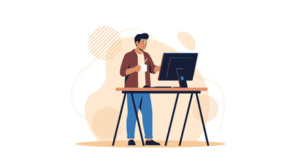 A man in front of a computer, working from a standing desk with a cup in hand