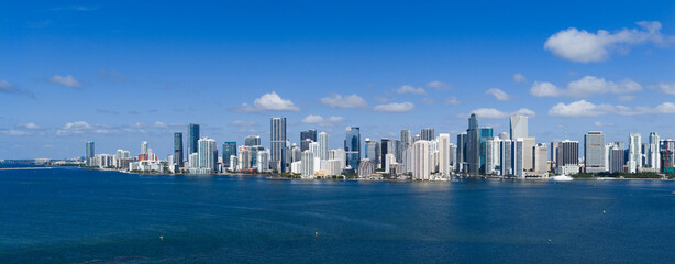 Naklejka premium Panoramic view of Miami skyline. Panoramic cityscape of Brickell Miami. Skyscrapers of Brickell. Panoramic view of the Miami financial district. Panoramic aerial of Brickell in Miami Beach.