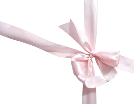 Close-up of a pink satin bow with intertwined ribbons, isolated on black
