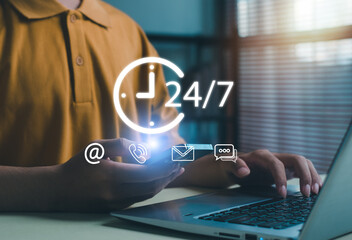 24-7 customer support and online service concept showing person using smartphone and laptop with glowing icons of email, phone, and chat representing digital communication and assistance.