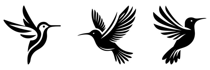 Obraz premium Hummingbird Silhouettes: Elegant Black Bird Designs in Flight.