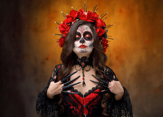 Close-up gothic fantasy woman with halloween make-up sugar skull sceleton body art beauty scary...