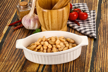 Baked white canned beans in the bowl