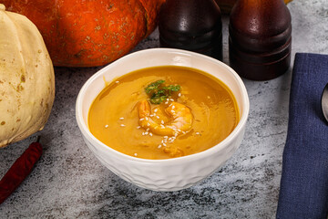 Pumpkin cream soup with prawns
