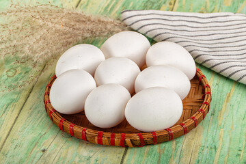 Raw white uncooked chicken eggs