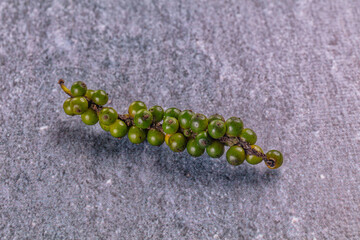 Ripe green pepper corn branch