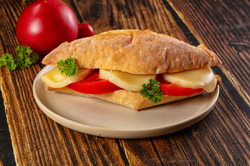 Sandwich with mozzarella and tomato