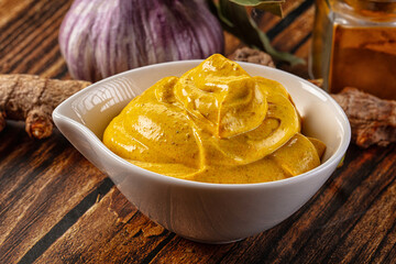Indian yellow spicy curry sauce