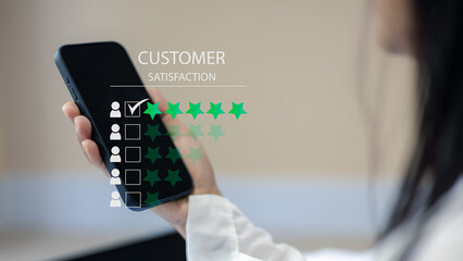 Customer Satisfaction and Online Review Concept with Smartphone and Rating Stars