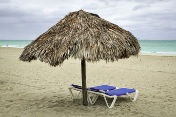 Beach chairs and umbrella on the beach