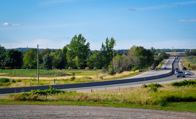 Cars on road in a beautiful day 