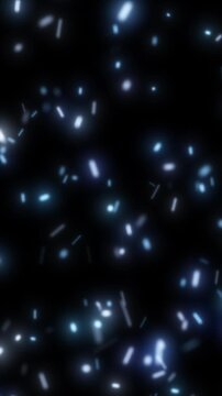 Abstract glowing blue light particles floating in darkness, symbolizing technology, data, and futuristic energy