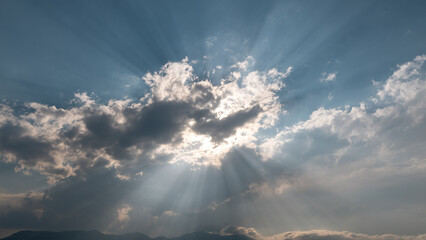 The sun behind the clouds 